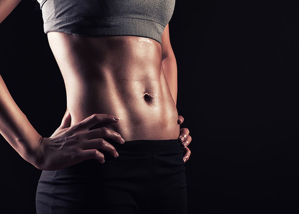 A slim waist and a flat stomach are the result of hard training
