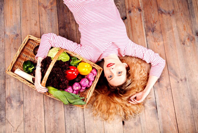 Girl with vegetable basket